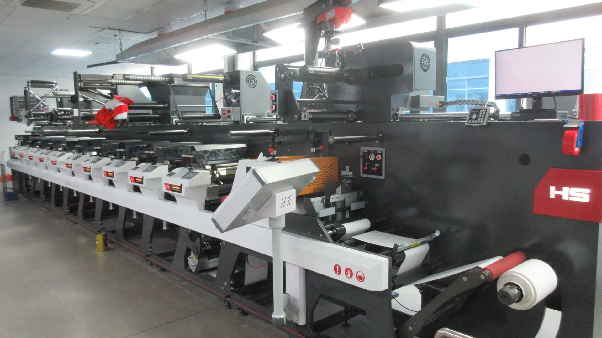 Label printing production line from the supplied factory photographs